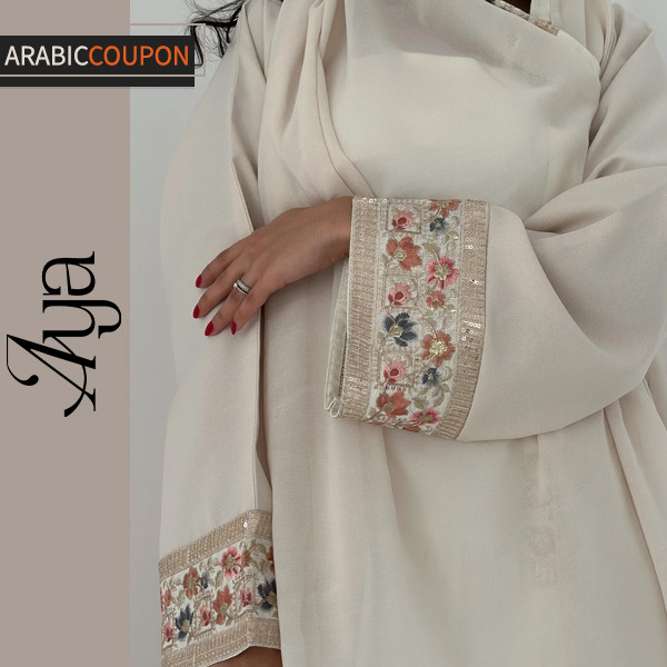 Aya Abaya in light colors and cheerful embroidery for winter Aya Abaya in light colors and cheerful embroidery for winter