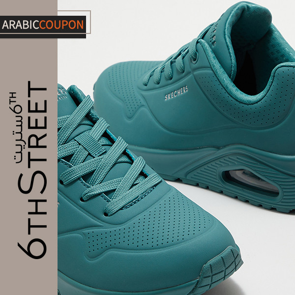 Green Skechers sneakers