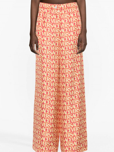 Luxurious look by Versace silk trousers, now at 75% off with Farfetch promo code