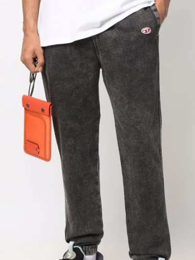 Take advantage of Farfetch coupon & offers to buy fashionable black Diesel jeans and save over 75%