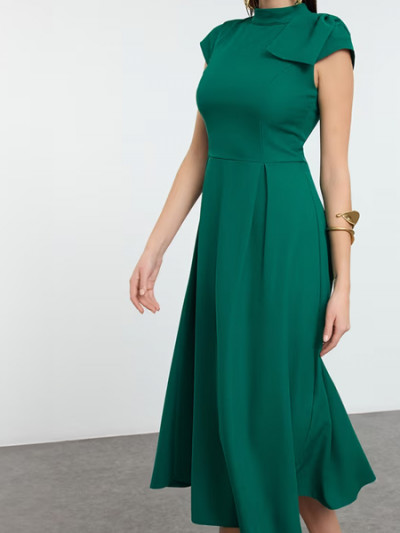 Trendyol green dress to celebrate Saudi National Day at half price with Vogacloset coupon